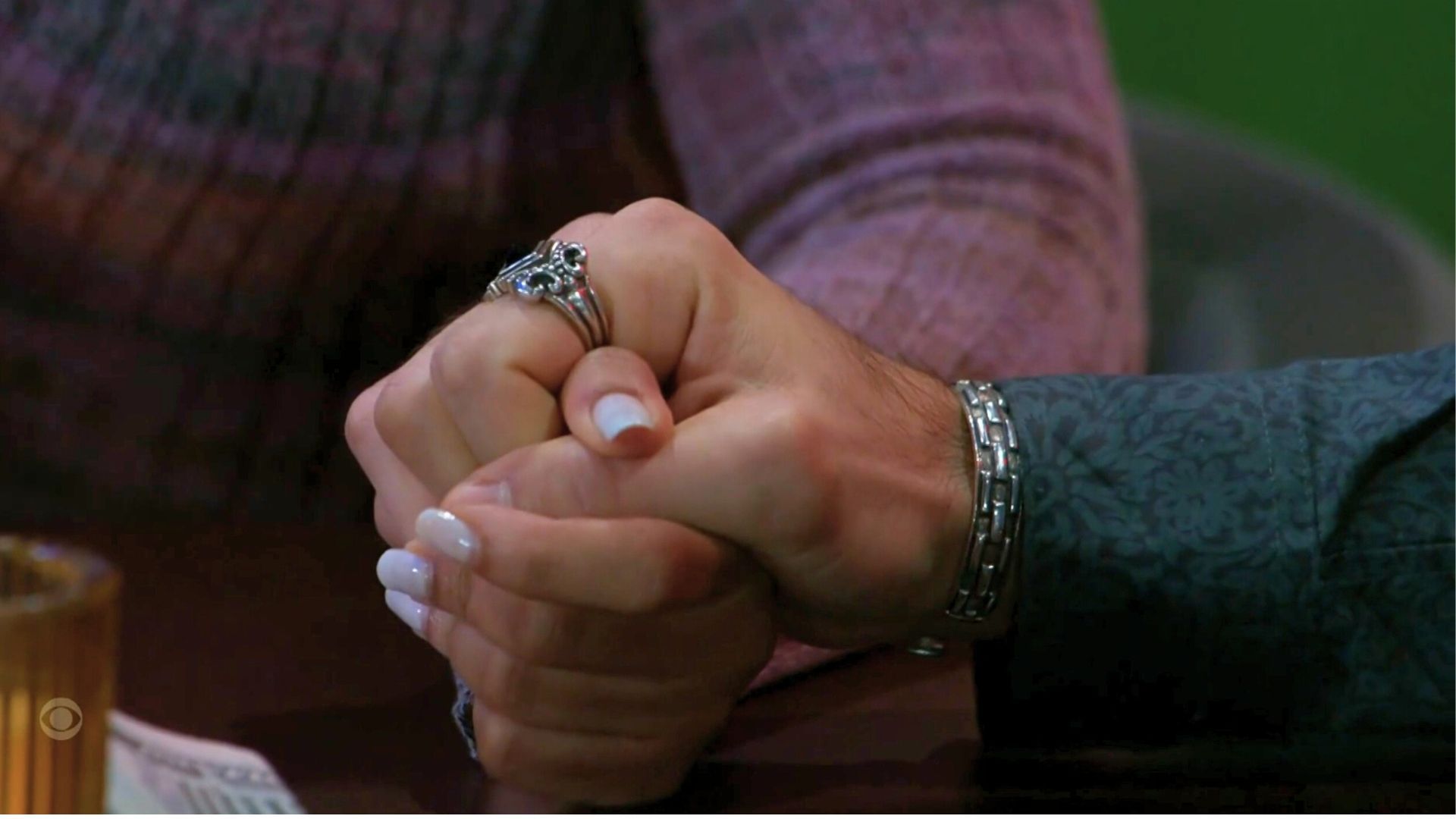 Beyond the Gates: Tomas holds Eva&#039;s hand | Image: CBS