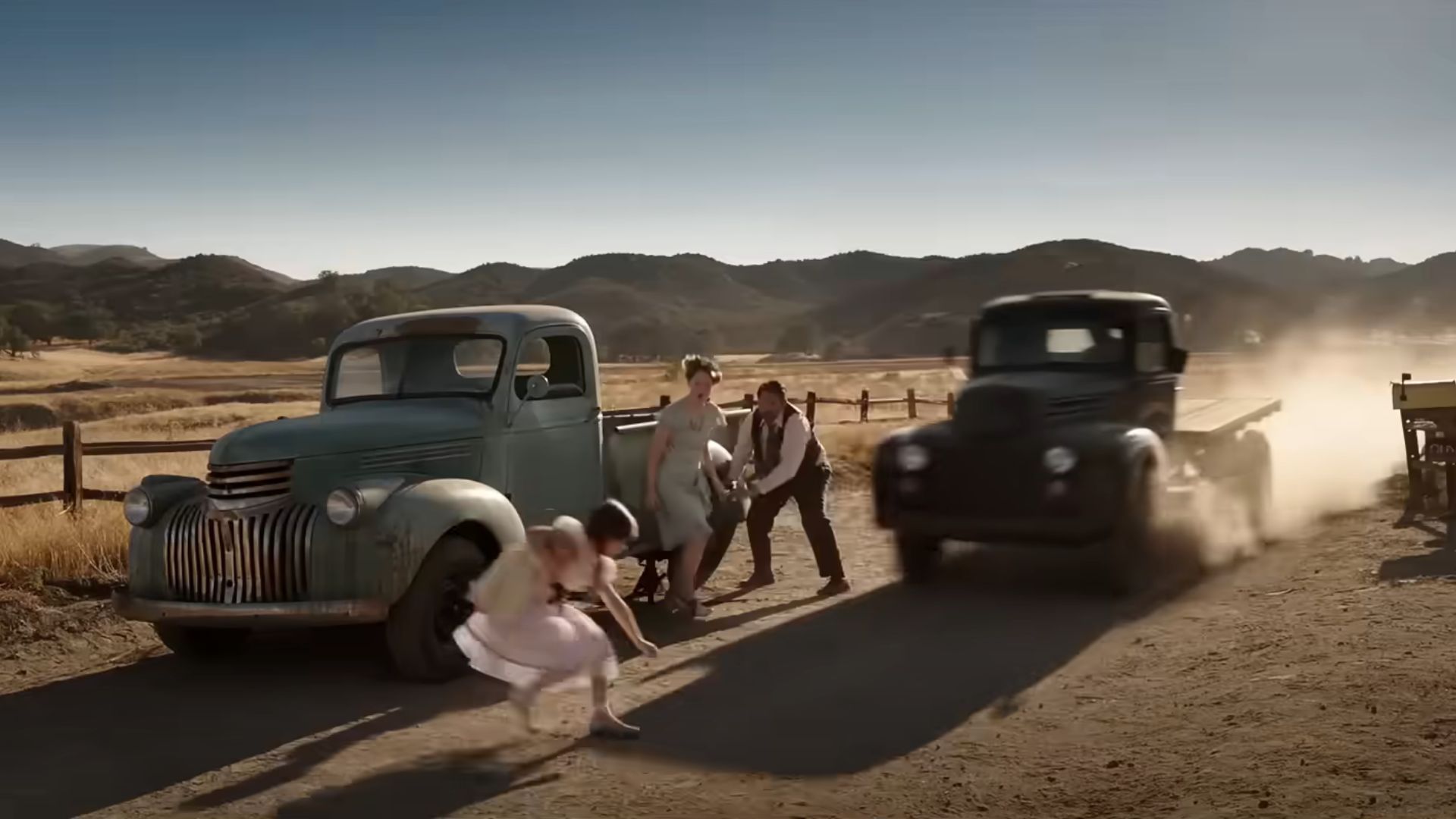 A little girl about to get hit with a car