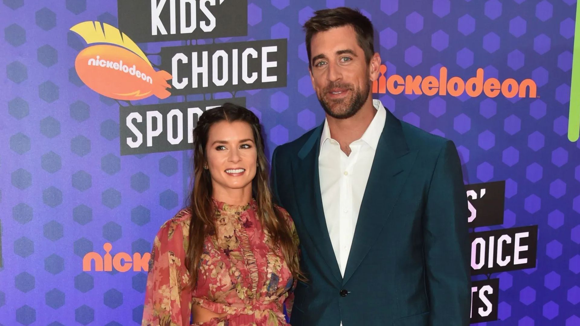 Danica Patrick &amp; Aaron Rodgers - Source: Photo by Alberto E. Rodriguez/Getty Images For Nickelodeon