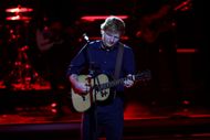 Ed Sheeran performing live. (Image via Getty)