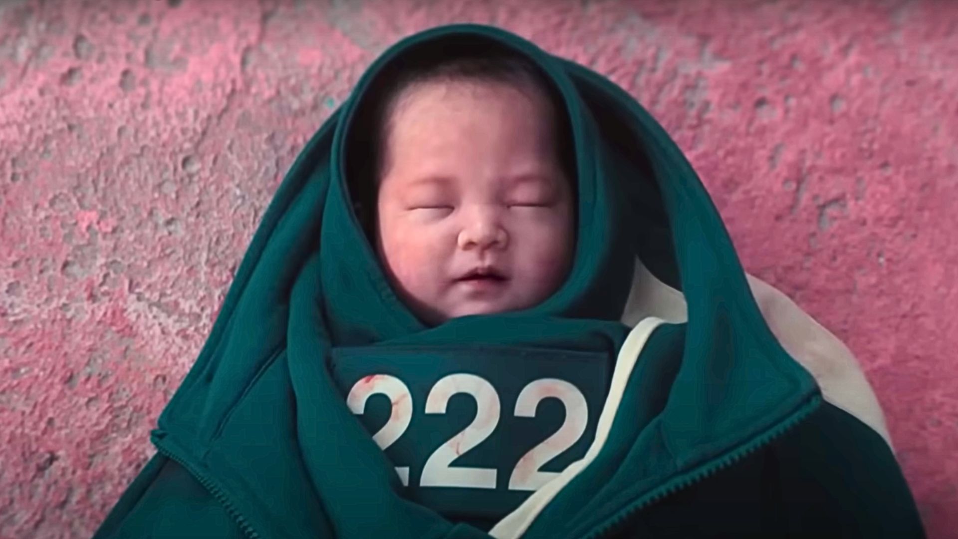 Player 222&#039;s baby in Squid Game Season 3 (Image via Netflix)
