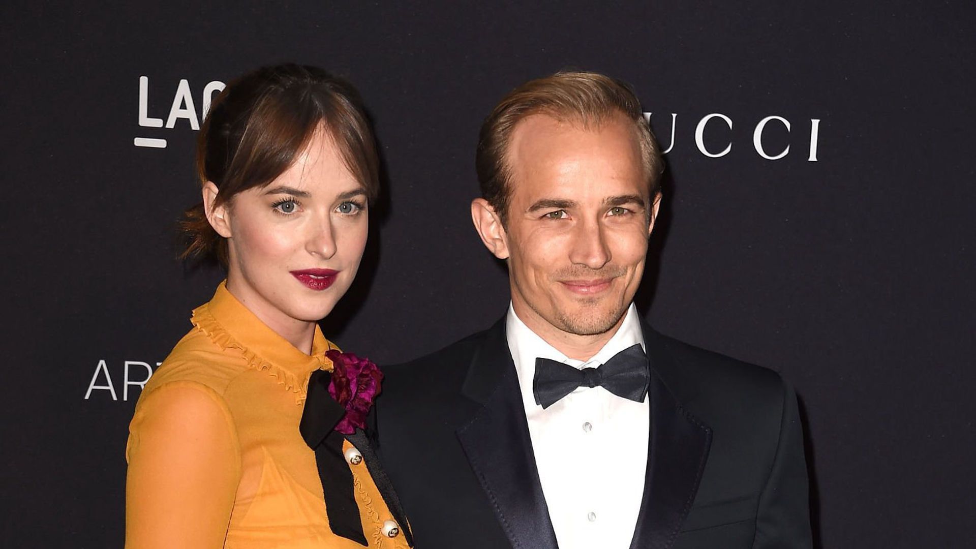 Dakota Johnson and Jesse Johnson arrive at the LACMA 2015 Art+Film Gala - Arrivals - Source: Getty