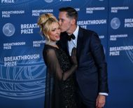 Paris Hilton and Carter Reum (Image via Getty)