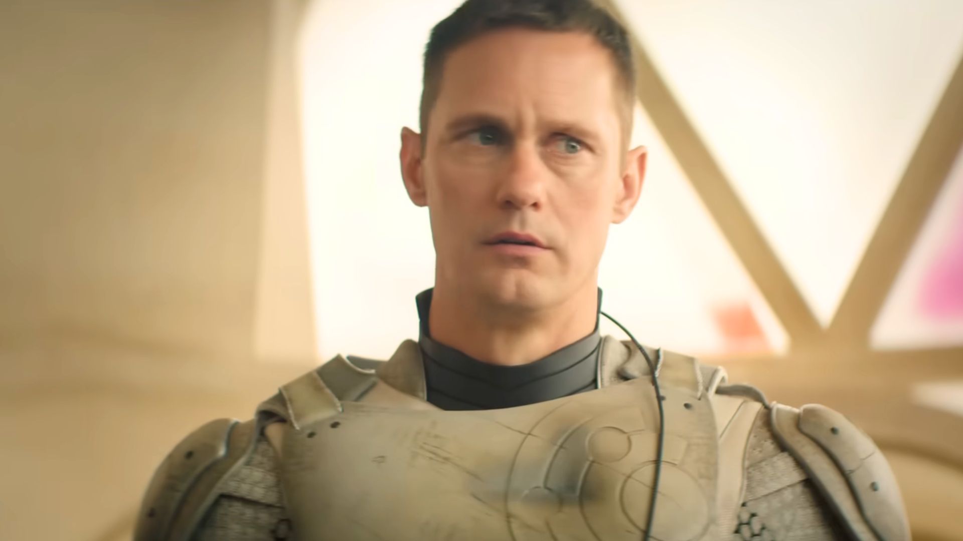 Alexander Skarsg&aring;rd in Murderbot | Image via Apple TV