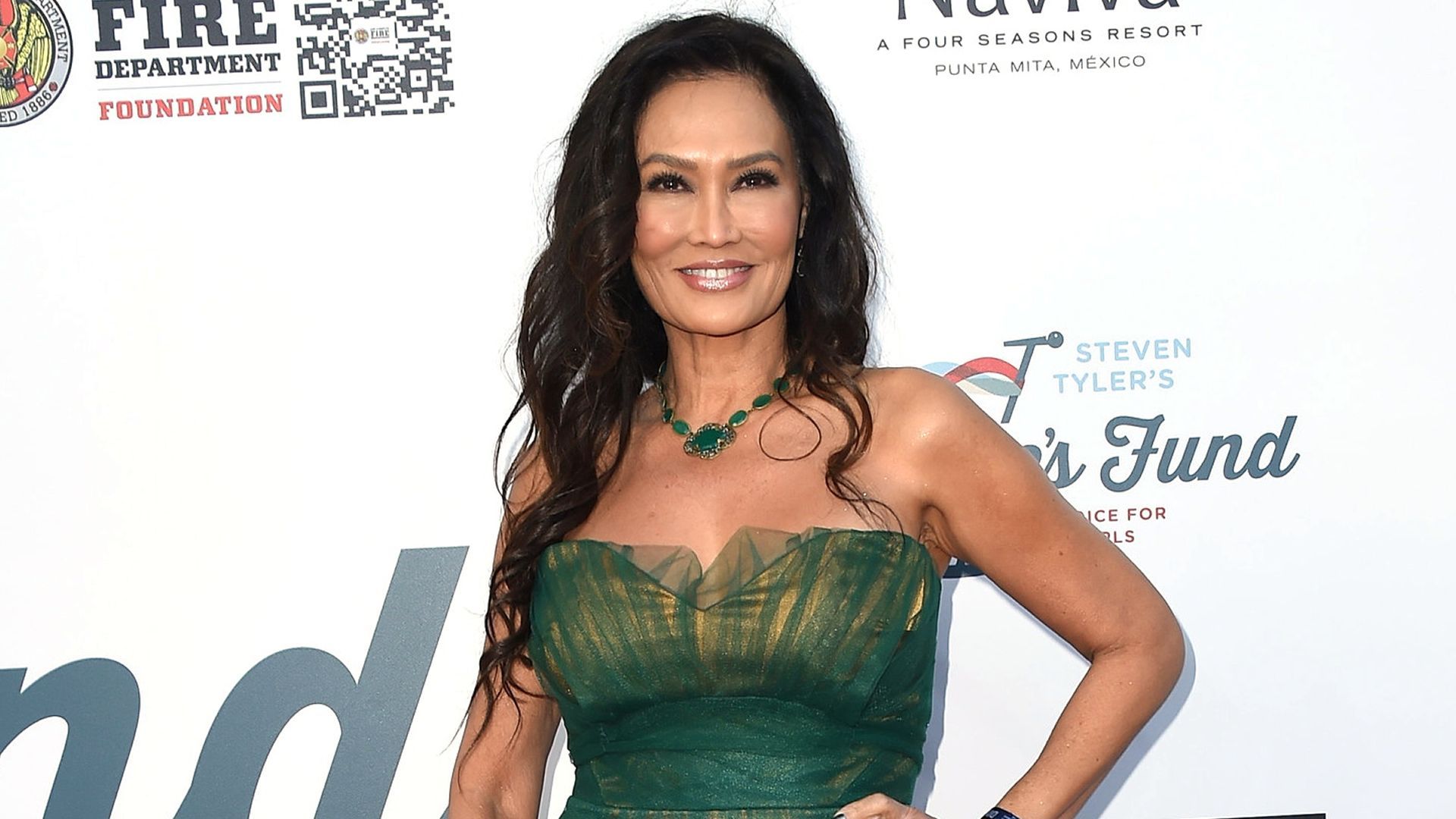 Tia Carrere. | Image Source: JPI