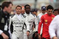 Carlos Sainz with Brad Pitt and Damson Idris during F1 The Movie / Source: Getty