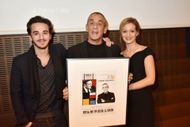 Thierry Ardisson (center) with son Gaston Ardisson and wife Audrey Crespo-Mara (Image via Getty)