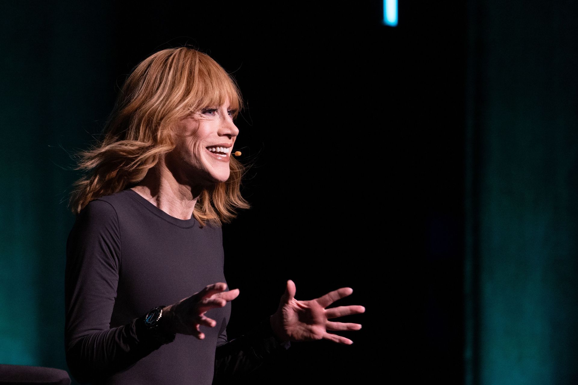 Kathy Griffin rocks natural curls and her own merch on casual LA outing