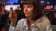 Mia Wallace sits with a cigarette in her hand. (Image via A Band Apart)