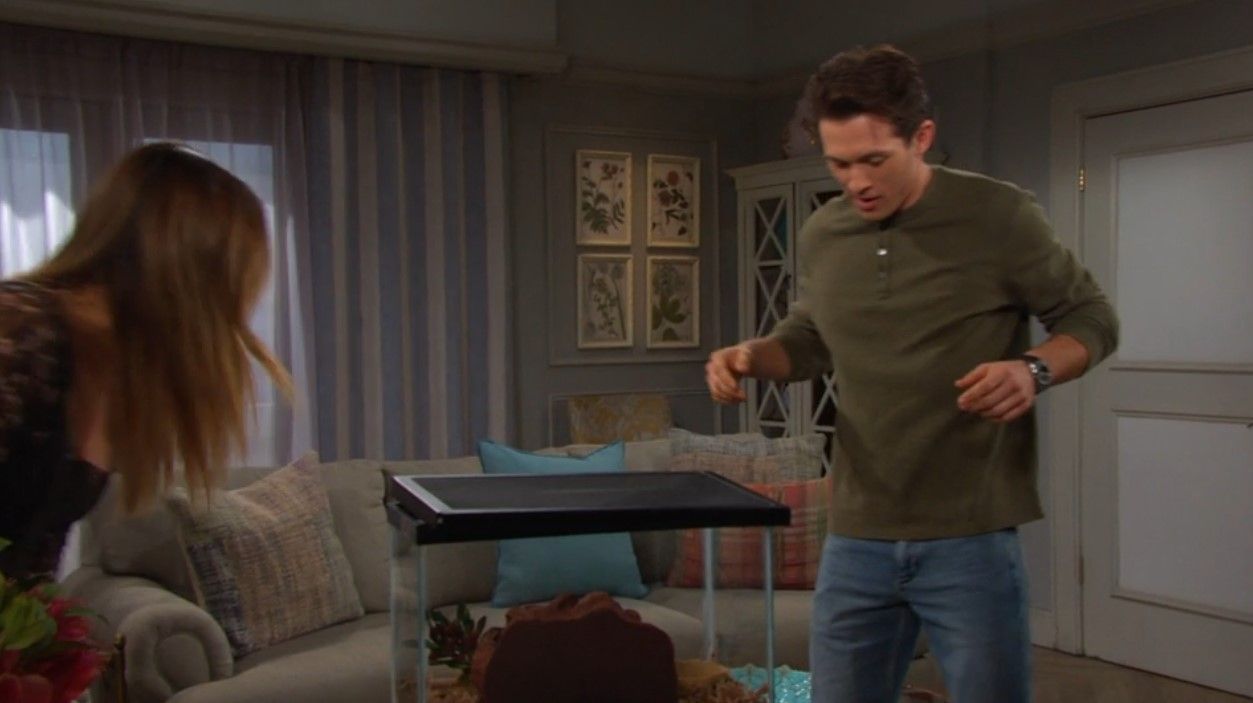 An uninvited guest killed the mood for Tate (Leo Howard) and Holly (Ashley Puzemis). \Image: Peacock