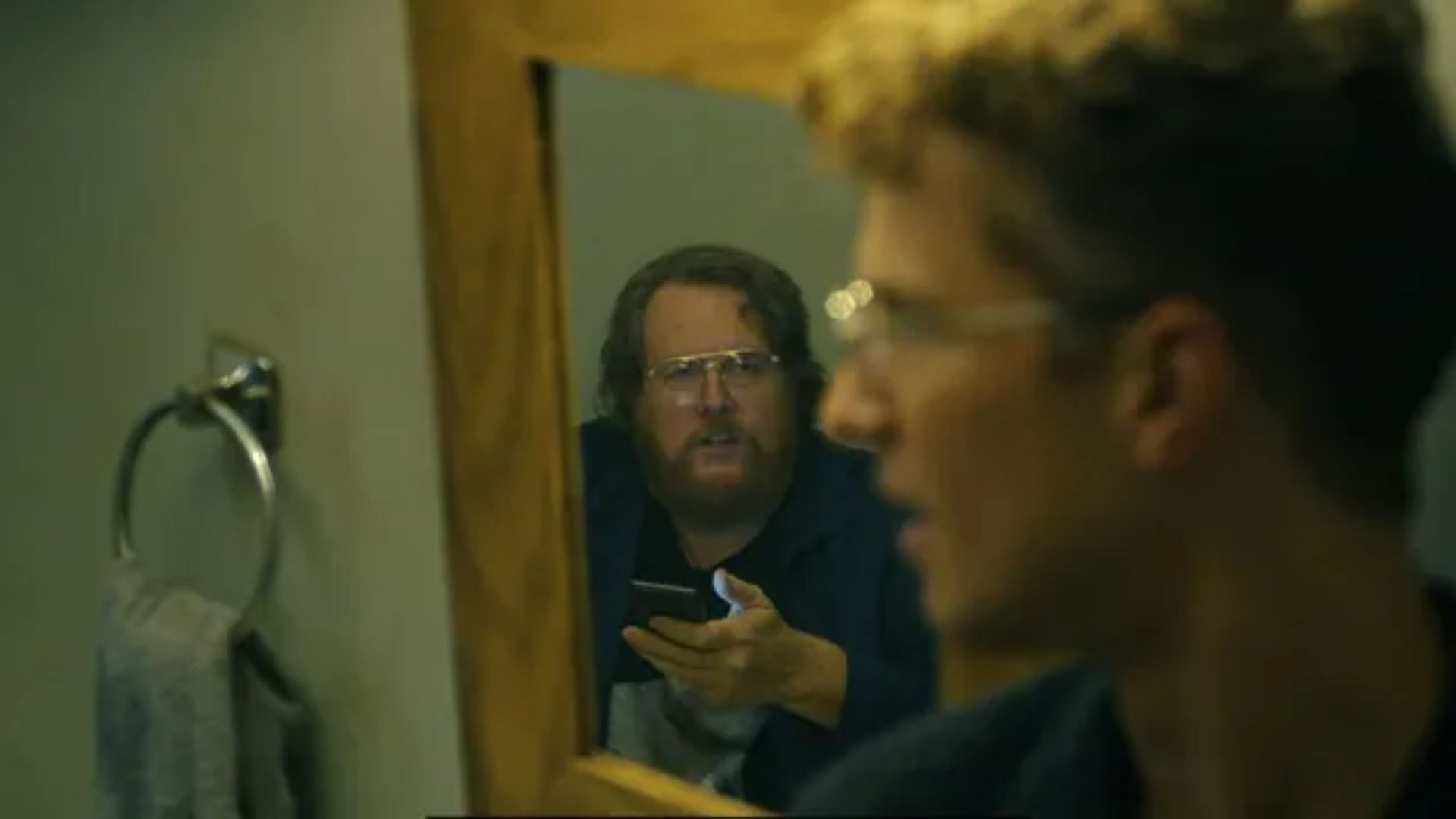 Vigilante and Economos (Image via HBO Max)