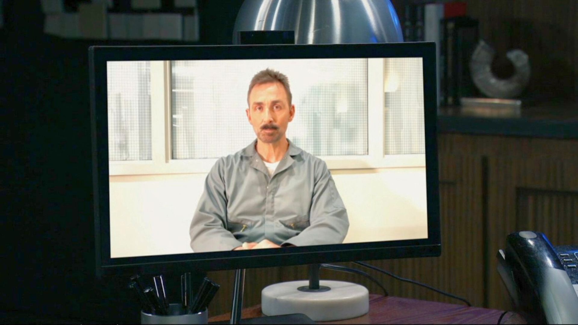 Valentin bargains with Brennan during a video chat from Steinmauer on General Hospital | Image: ABC