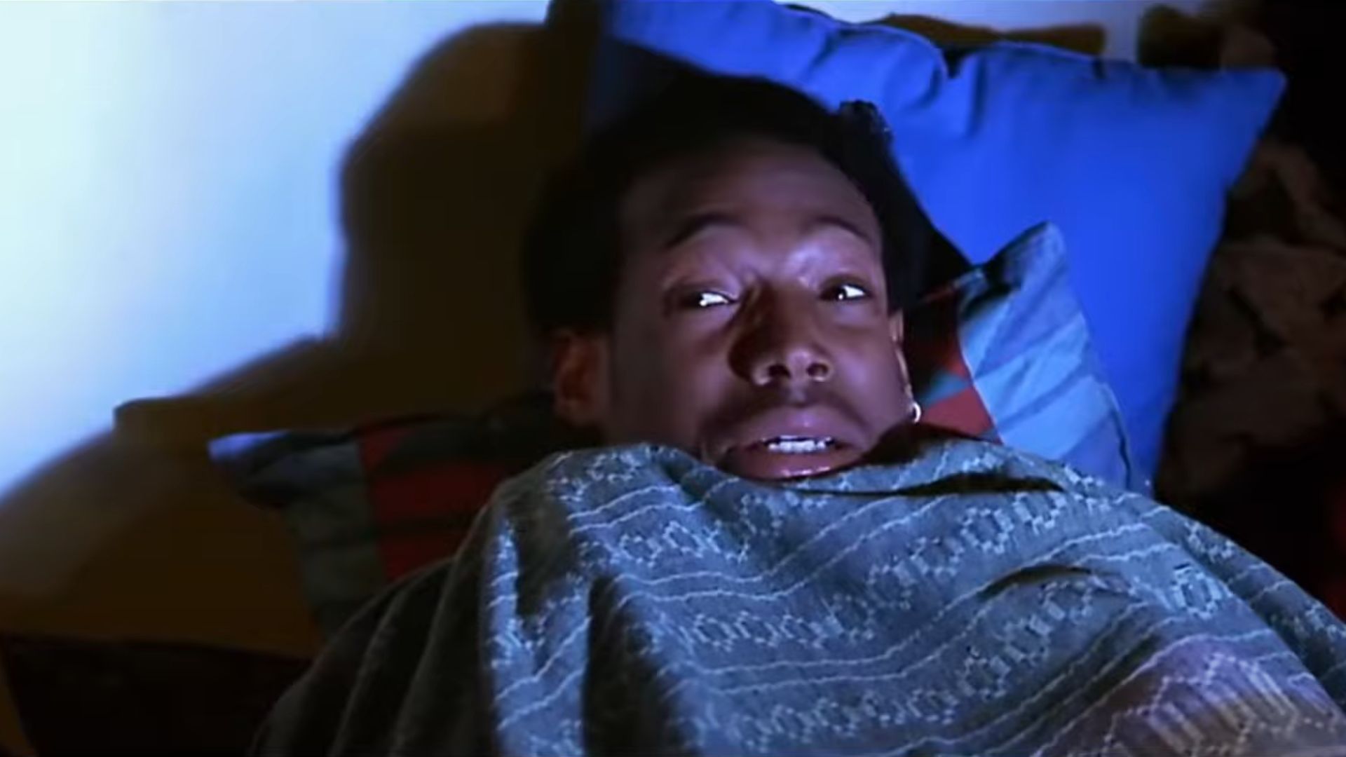 Shorty is afraid and tucked in bed