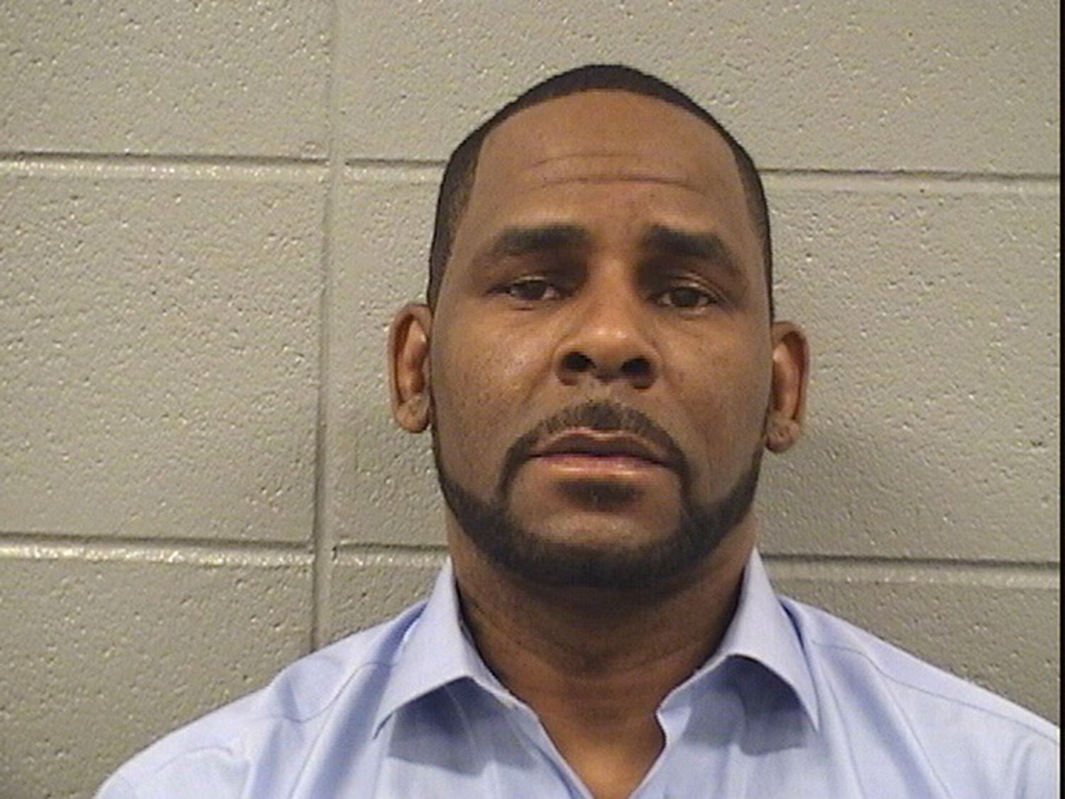 R. Kelly&#039;s Mugshot After Arrest - Source: Getty