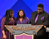 Angie Stone's granddaughter, Diamond, and Swayvo Twain at her Homegoing Service - Source: Getty