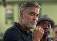 George Clooney and Don Cheadle (in the background) - Source: Getty