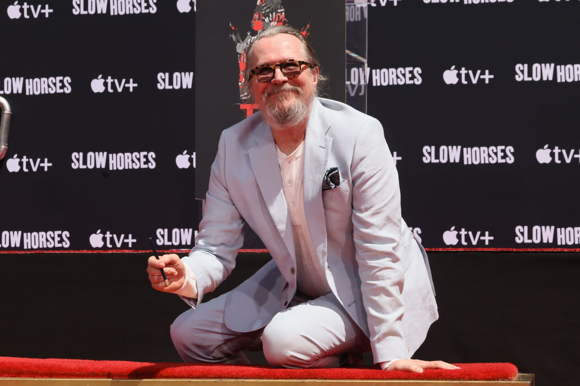 Gary Oldman Hand And Footprint In Cement Ceremony At TCL Chinese Theatre - Source: Getty