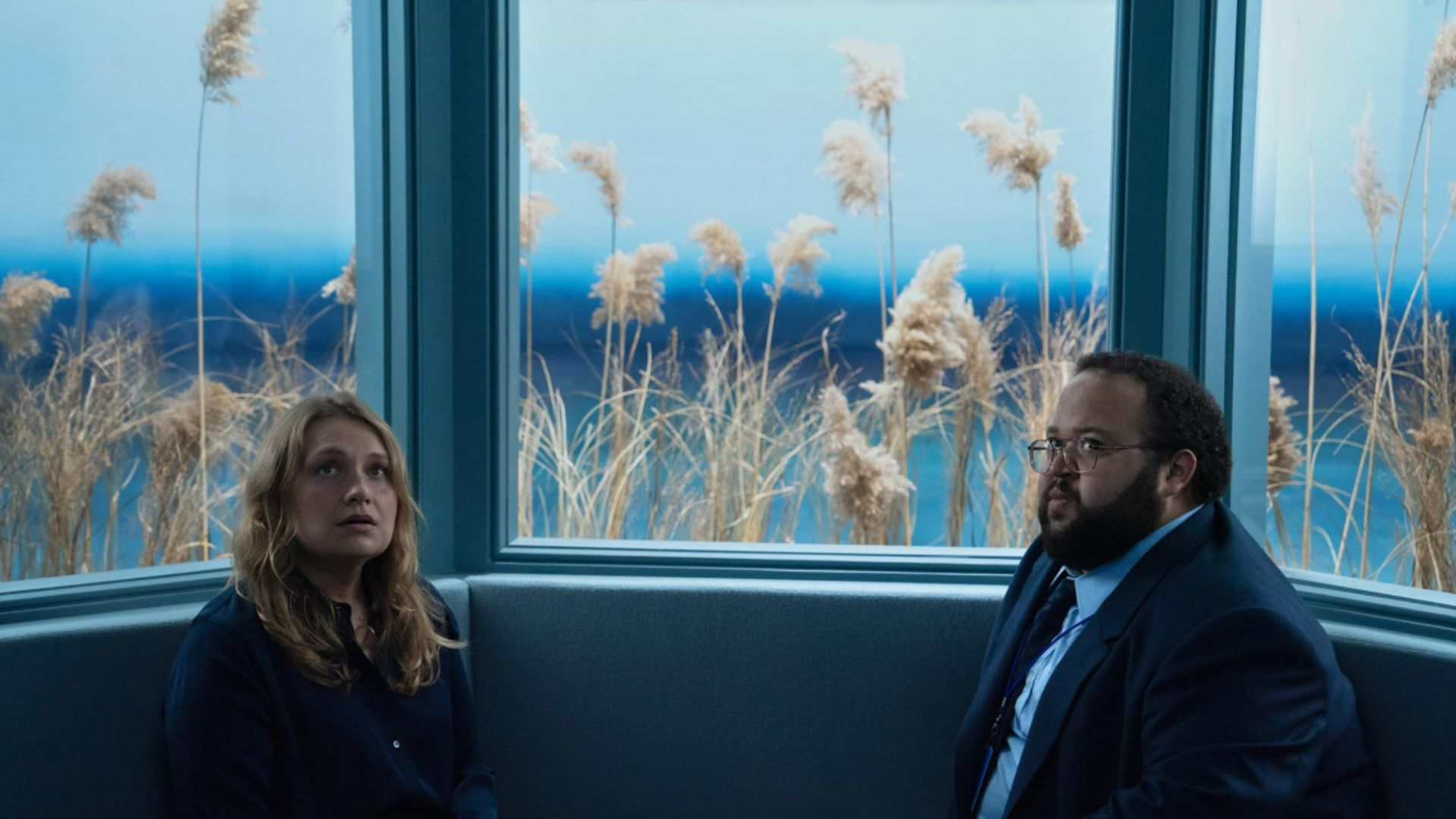Merritt Wever and Zach Cherry in Severance (Image via Apple TV)