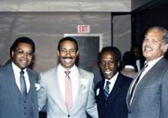 Smiling portrait of faculty members - Source: Getty