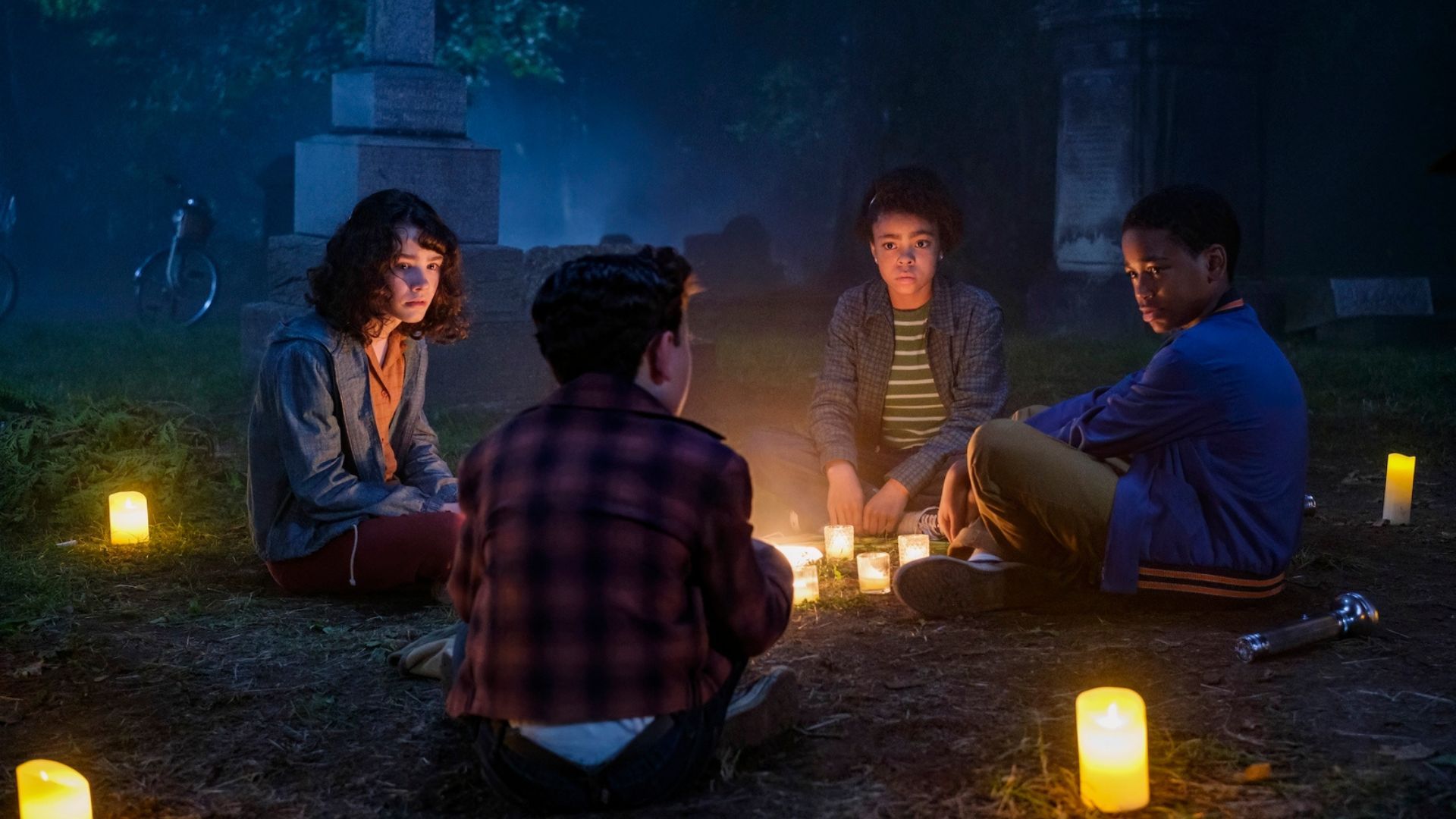 The kids try to summon the evil entity | Image Via: press.wbd.com