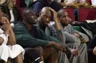 (L-R) Reggie Evans #30, Elden Campbell#42, and Calvin Booth#52 looks on the game - Source: Getty